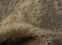 Mudcake is a luxurious brown mohair with a hint of green and a soft and fluffy 20 mm pile. It's a great colour for medium and large traditional teddy bears, the green tinge makes it particularly suitable for bears you want to look old and have a bit of character.