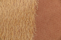 Peanut Relish 12 mm quite sparse, distressed (ratinee) mohair for teddy bears with a caramel pile and pale tan backing This has a moderately short, distressed, fairy sparse, caramel gold (quite like a peanut's colour) pile and a pale tan backing, which helps make your bear's face stand out.  It's a great colour for smaller traditional teddy bears, or larger bears that you want to look old and loved. 