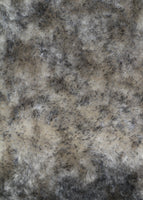 Smoked Truffle 25 mm (one inch) charcoal tipped cream, dense, distressed mohair for teddy bears with a cream backing Smoked Truffle is a gorgeous charcoal-tipped cream mohair with a soft and fluffy 1 inch pile. It's a great colour and texture for medium and large teddy bears. The backcloth is also cream meaning that if you trim the snout of your bear it will have a cream snout and an interesting smoky colouring.